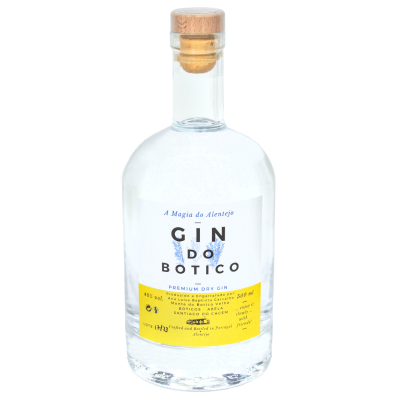 Garrafa transparente de gin com rótulo branco e amarelo e tampa de cortiça