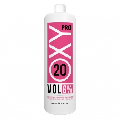 Frasco branco com rótulo rosa e texto preto e branco, produto tem texto PRO OXY 20 VOL 6%.