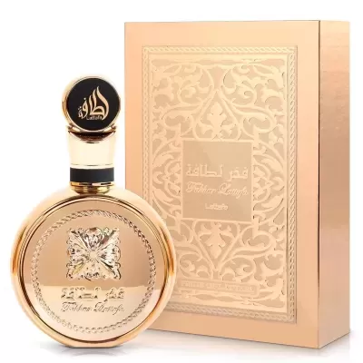 Frasco redondo de perfume dourado com caixa bege decorada