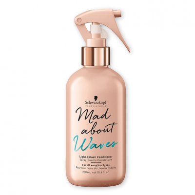 Frasco rosa metalizado de spray Schwarzkopf Mad about Waves para cabelos ondulados