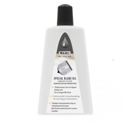 Frasco branco de óleo especial para lâminas WAHL com tampa preta.