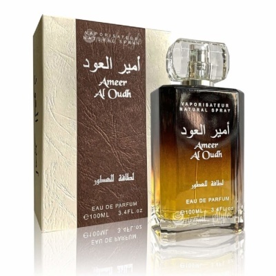 Frasco de perfume Ameer Al Oudh com embalagem e texto em árabe e inglês