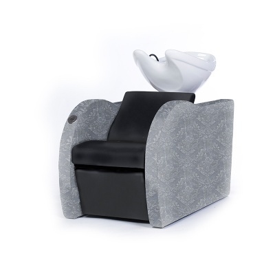 Cadeira de cabeleireiro com lavatório branco e assento em pele preta com estofado cinza padrão floral