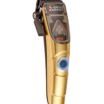 Máquina de cortar cabelo dourada com detalhes pretos e botão azul iluminado