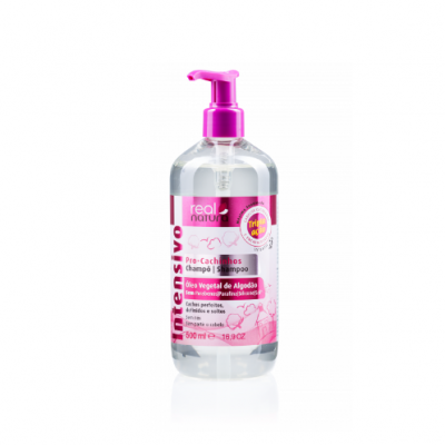 Frasco de shampoo para cachorros Real Natura com doseador rosa sobre fundo branco