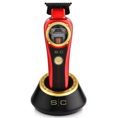 Aparelho de barbear elétrico vermelho e preto com base preta e dourada