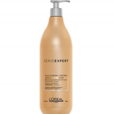 Frasco dourado do produto L'Oréal Serie Expert Absolut Repair com tampa de bomba
