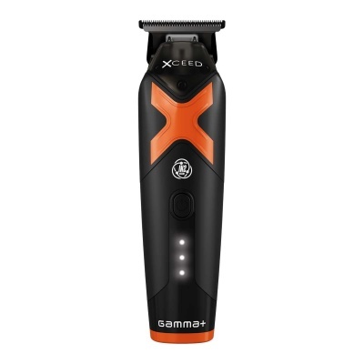 Máquina de cortar cabelo preta e laranja Gamma+ com lâmina metálica e luzes indicadoras