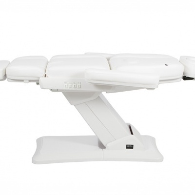 Cama de massagem branca ajustável com controles laterais