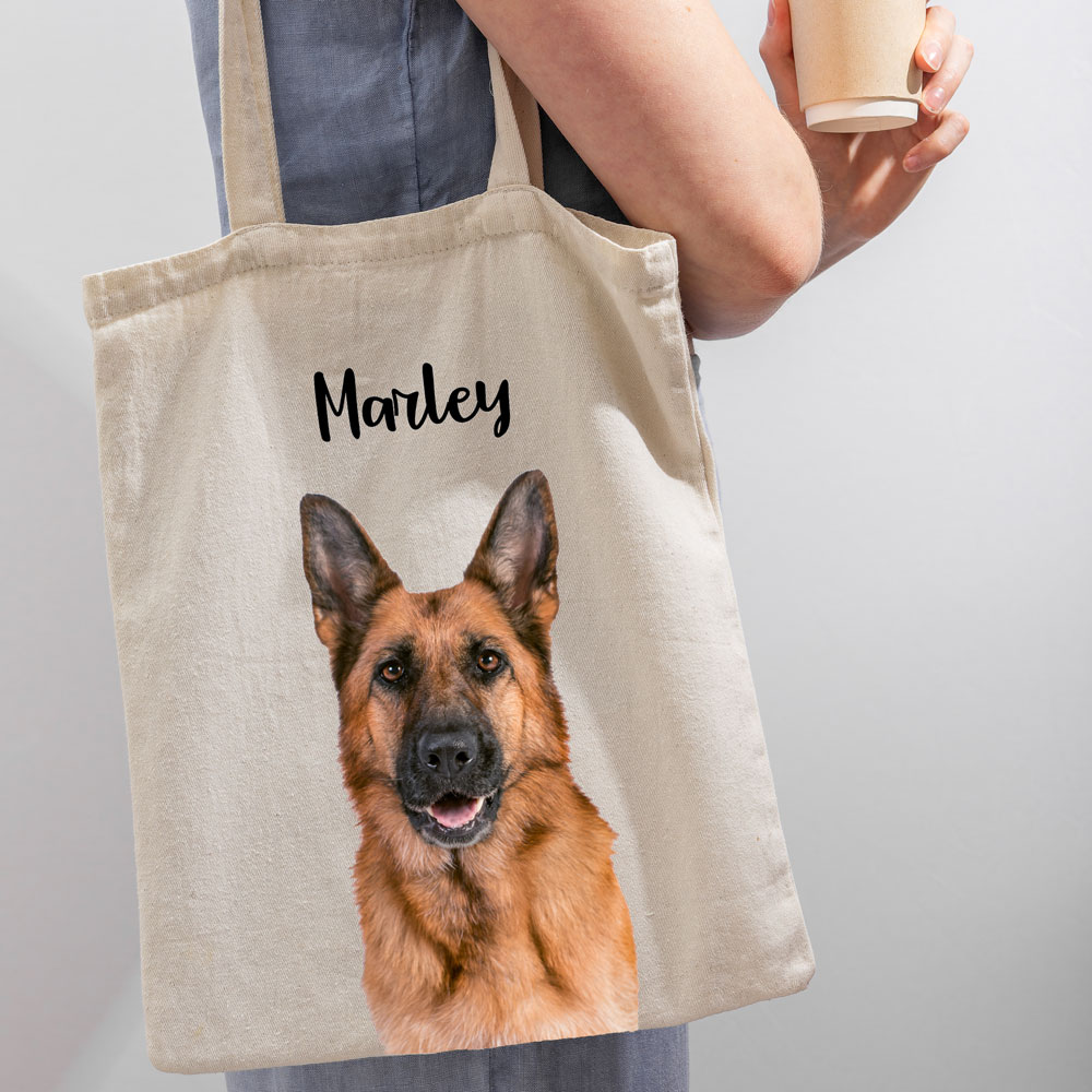 Saco de tecido bege com impressão de cão pastor alemão e texto 