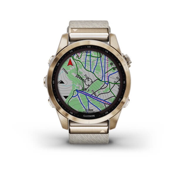 Fēnix® 7s sapphire solar creme dourado em titânio com bracelete creme em nylon 010-02539-39 Relógio Garmin com ecrã a mostrar mapa topográfico