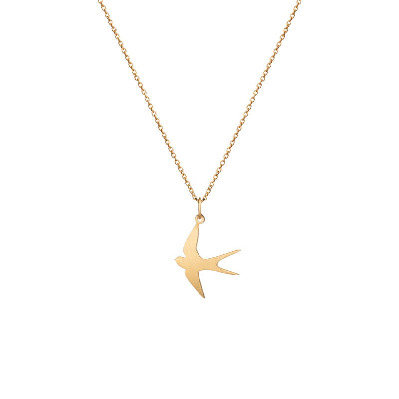 OMNIA Colar Andorinha Dourado Colar dourado com pendente de andorinha em fundo branco