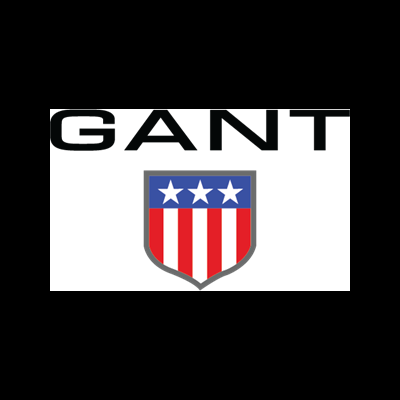 Logótipo GANT com escudo de estrelas brancas e listas vermelhas e brancas.