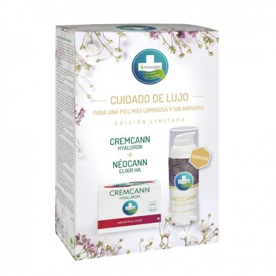 Embalagem de cosméticos com frascos Cremcann Hyaluron e Néocann Elixir HA, decoração floral