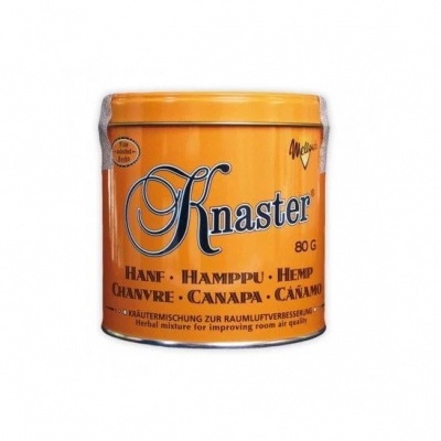 Lata laranja do produto Knaster de 80g com texto em vários idiomas