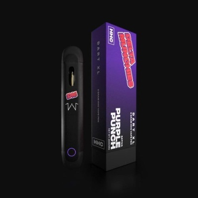 Dispositivo eletrônico preto e embalagem roxa com texto em branco e preto