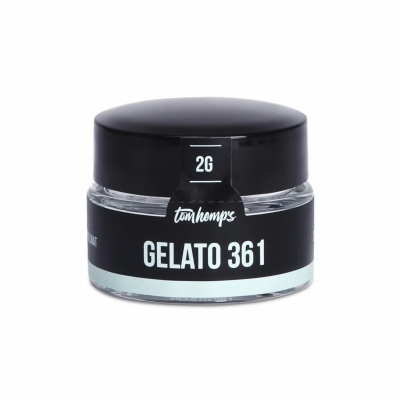 Frasco pequeno de vidro com tampa preta e etiqueta preta com texto branco