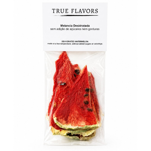 Melancia Desidratada Pacote de melancia desidratada True Flavors com sementes em embalagem transparente e etiqueta branca
