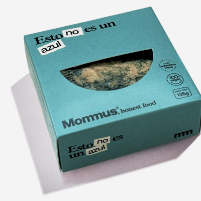 Caixa azul com produto visível e texto em espanhol e inglês