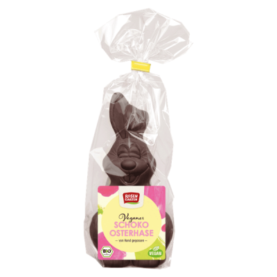 Coelho de chocolate vegano embalado em plástico transparente com etiqueta colorida