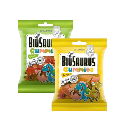 Embalagens verdes e amarelas de gomas Biosaurus Gummies com ilustrações de dinossauros