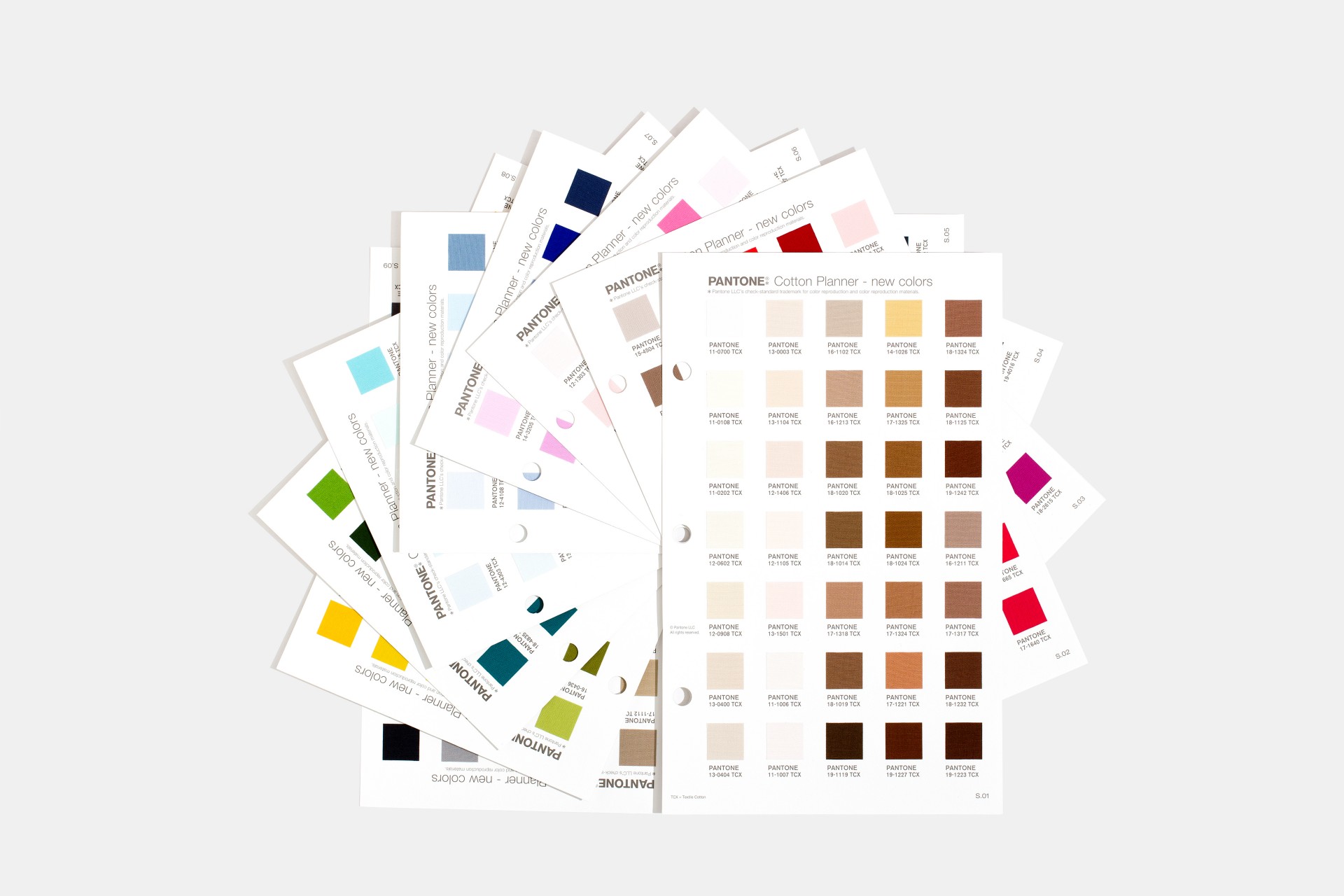 FHI Supplement Cotton Planner Folhas de amostras de cores Pantone em formato de abanador sobre fundo branco