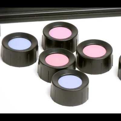 Sombras de olhos em recipientes circulares pretos em tons de rosa e azul claro