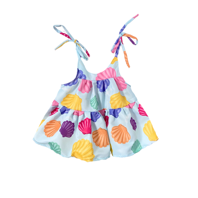 Vestido infantil estampado com conchas coloridas em fundo azul claro