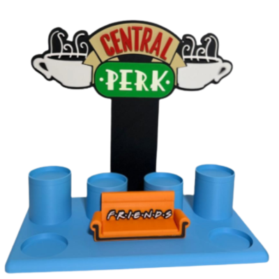 Suporte de silicone azul com sofá laranja e placa Central Perk