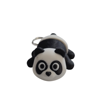 Figura ou chaveiro de panda preto e branco em plástico texturizado