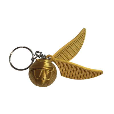 Chaveiro dourado com anel e elementos em relevo e textura