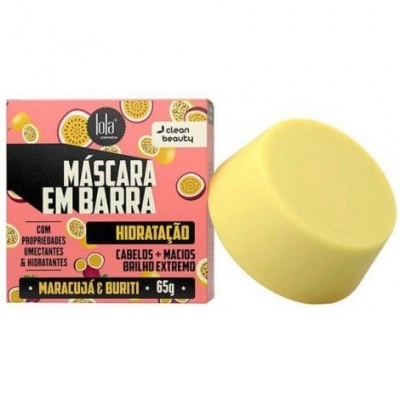 Máscara em barra amarela com embalagem rosa e preta, texto em português.