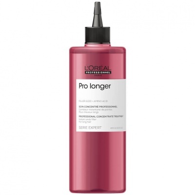 Frasco rosa de tratamento profissional para cabelo com rótulo branco e texto da L'Oréal
