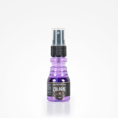 Frasco pequeno roxo de colónia com vaporizador preto