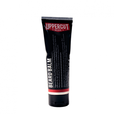 Tubo preto de bálsamo para barba Uppercut Deluxe com texto em vermelho e branco