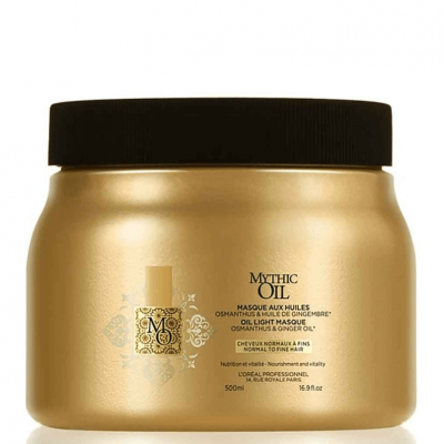 Frasco dourado com tampa preta de máscara capilar Mythic Oil