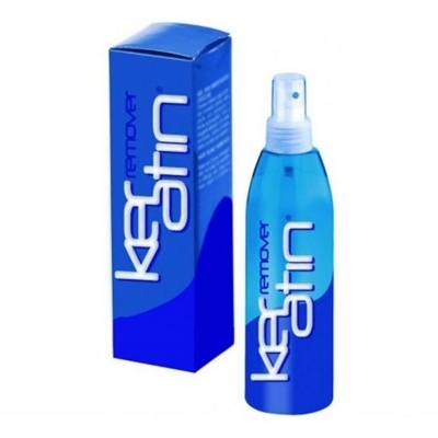 Frasco azul de spray e caixa azul do produto kerstin remover