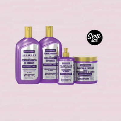 Conjunto de produtos capilares roxos com tampas amarelas sobre fundo rosa claro