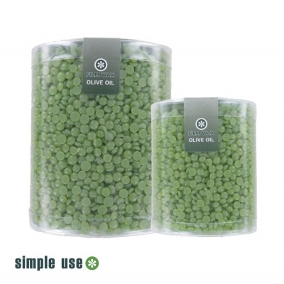 Dois recipientes transparentes com pastilhas verdes de cera rotulados como PURE WAX OLIVE OIL