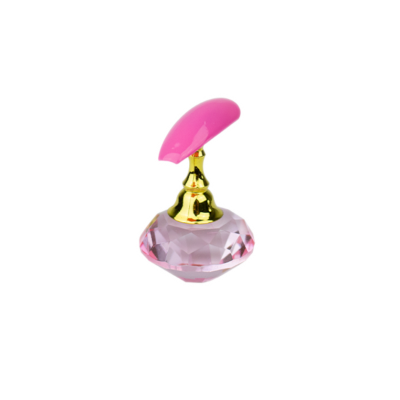 Base em cristal rosa com aplicador rosa e detalhes dourados