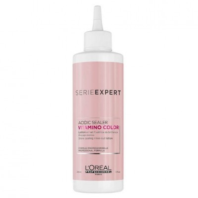 Frasco rosa e branco de loção para cabelo L'Oreal Série Expert Vitamino Color