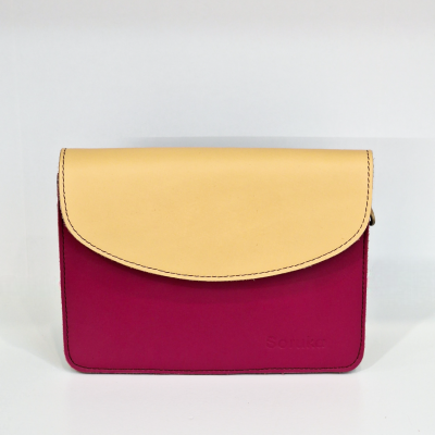 Mala pequena de couro rosa e bege com gravação Sonlice