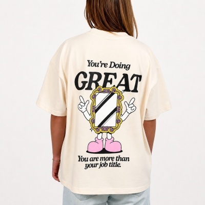 Back view of cream t-shirt with cartoon mirror graphic and motivational text