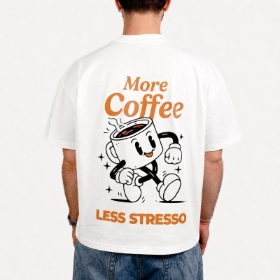 White t-shirt with cartoon coffee cup and text More Coffee Less Stresso on back