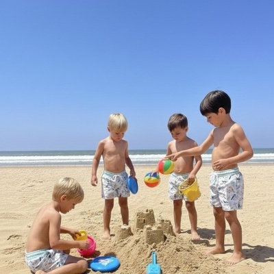 Crianças a construir castelo de areia na praia com brinquedos coloridos