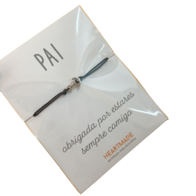 Pulseira preta e prata em embalagem branca com texto para pai