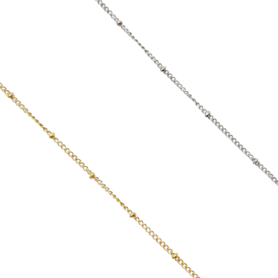 Duas correntes finas, dourada e prateada, com pequenos detalhes esféricos