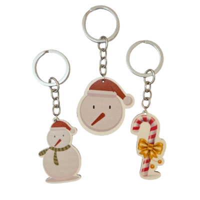 Três porta-chaves natalícios com bonecos de neve e bastão de doces coloridos