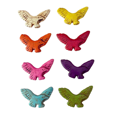 Oito figuras de pássaros coloridos em pedra com textura rachada