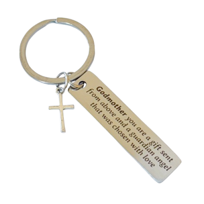 porta-chaves metálico com cruz e pendente retangular com mensagem em inglês